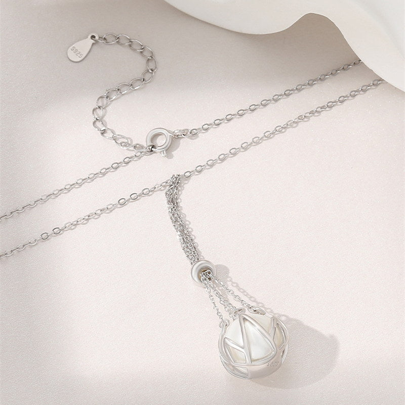 Conch Pearl in Cage Necklace  Huge Cage Pendants Selection